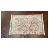 distressed-style accent rug in red and ivory w