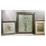 framed floral wall art set appears to feature a