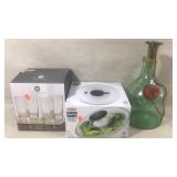 Glass cups, salad spinner and glass bottle