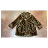Dennis Basso brown faux fur coat featuring a