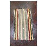 vintage handwoven flat-weave rag rug featuring a
