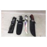 Four Knives with Sheaths and Varied Designs