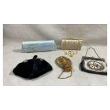 collection of five vintage evening bags in