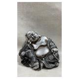 silver metallic happy sitting Buddha statue