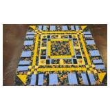 handmade patchwork quilt features a framed