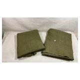 pair of folded, olive drab military-style wool