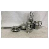 Pewter Tableware With Decorative Designs