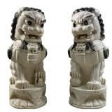 Pair of antique ivory carved foo dog sculptures