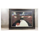 framed artwork appears to be a print or