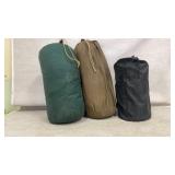 Three Camping Sleeping Bags in Carry Bags