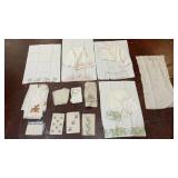 collection of vintage white fabric linens,