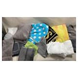 collection of various folded and stacked towels