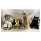 collection of four vintage-style plush and doll