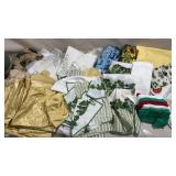 Large group of table cloths, fabrics, wash cloths