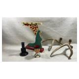 collection of vintage and folk art candleholders