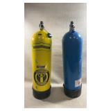 two vintage aluminum scuba diving cylinders,
