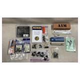 various firearm parts, accessories, and manuals