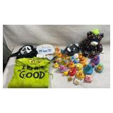 collection of novelty rubber ducks, plush items,