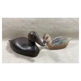 pair of hand-carved wooden duck decoys,