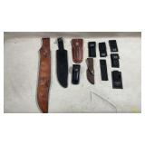 assortment of knife sheaths and cases, including