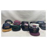 collection of vintage 1990s snapback caps,