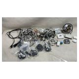 Large group of phone chargers and more