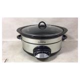 Rival crock pot slow cooked plugged in and