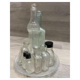 Plate of Petite Bottles - perfume?