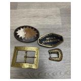 (4) Belt Buckles