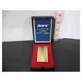 OLD MINT IN BOX SABRE GOLD TONE LIGHTER