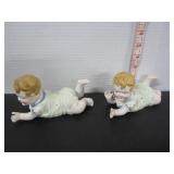 PAIR 'TN' BISQUE PORCELAIN PIANO BABY FIGURINES