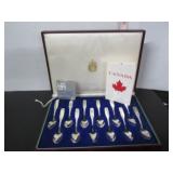 BOXED SET OF 12 PROVINCIAL SPOONS IN CASE