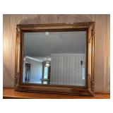 Heavy framed beveled mirror