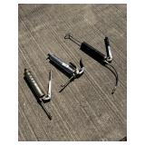 Three grease guns