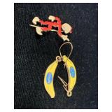 REDDY KILOWATT PIN AND CHIQUITA BANANA PIERCED