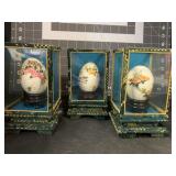 3 HAND-PAINTED EGGS IN SMALL DISPLAY CASES - 1 A