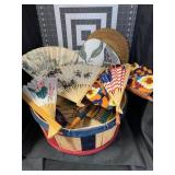 COLLECTION OF HAND FANS IN 1/2 BUSHEL BASKET