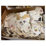 BOX FULL OF VINTAGE CANCELLED STAMPS