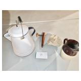 Enameled large pitcher and stoneware