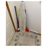 Cleaning supplies, rug, ironing board