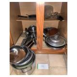 Cabinet of kitchen pots and pans