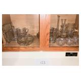 Shelf of Glass bowls, mugs, glasses