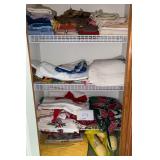 4 Shelves of towels, and linens