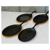 Cast Iron Skillets with 3 wood trivets