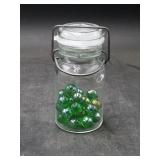 Vtg. Locking Jar with Green Marbles