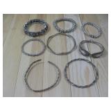 Eight Silvertone Bangle Bracelets See Info