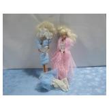 Two Barbie Dolls W/ Clothes