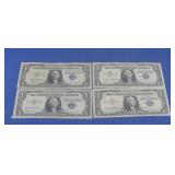 Four 1957 One Dollar Silver Certificates