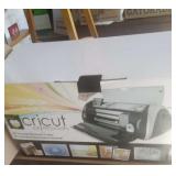 CRICUT MACHINE W/ 13 CARTRIGES & PAPER