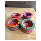 FOUR WOODEN ASHTRAYS
